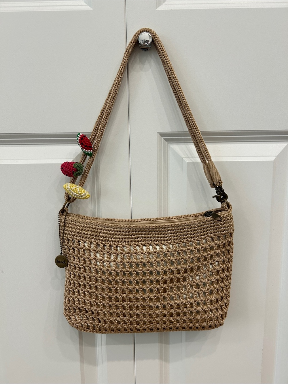 The Sak Crochet Shoulder Bag in Tan with Removable Fruit Accents